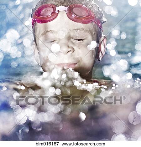 Stock Photo - Caucasian girl swimming in water. Fotosearch