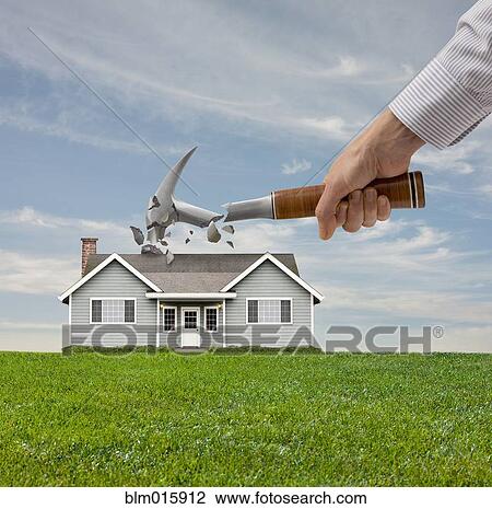 Caucasian man breaking hammer on house roof View Large Photo Image Stock Image - Caucasian man breaking hammer on house roof. Fotosearch