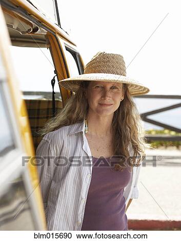 Caucasian woman standing in doorway of camper View Large Photo Image Stock Image - Caucasian woman standing in doorway of camper. Fotosearch