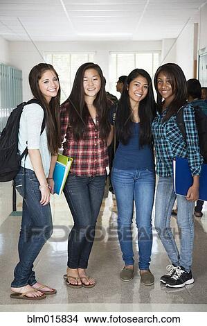 High school friends standing in corridor together View Large Photo Image Picture - High school friends standing in corridor together. Fotosearch