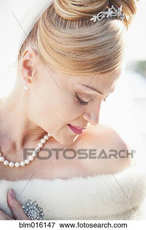 Hispanic bride looking down View Large Photo Image Stock Photo - Hispanic bride looking down. Fotosearch