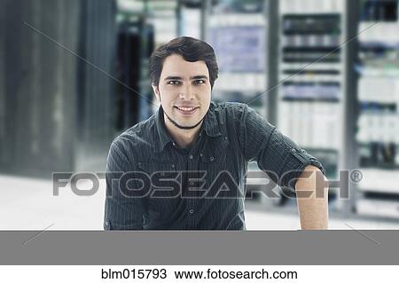Hispanic businessman in server room View Large Photo Image Stock Image - Hispanic businessman in server room. Fotosearch