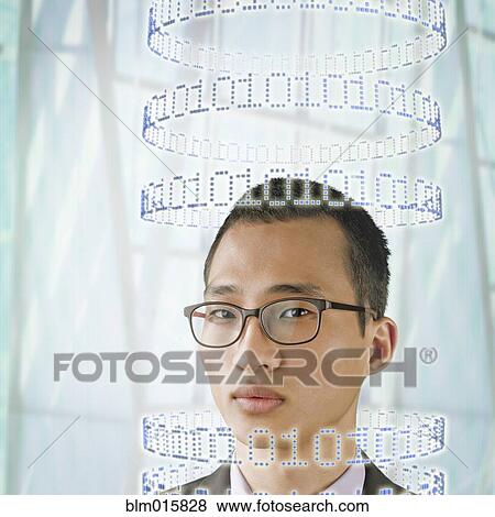 Stock Photo - Korean businessman surrounded by circles of binary code. Fotosearch