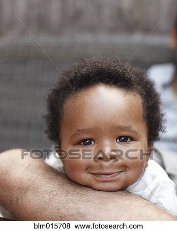 Smiling African American baby View Large Photo Image Stock Photo - Smiling African American baby. Fotosearch