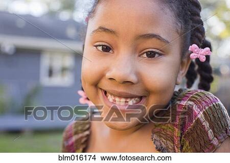 Smiling African American girl View Large Photo Image Picture - Smiling African American girl. Fotosearch