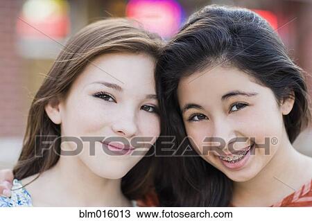 Smiling Hispanic friends View Large Photo Image Stock Image - Smiling Hispanic friends. Fotosearch
