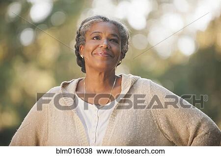 Stock Photo - Smiling mixed race woman. Fotosearch