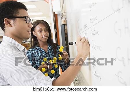 Stock Photography - Students learning about chemistry model. Fotosearch