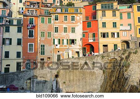 Apartment buildings on waterfront View Large Photo Image Stock Photograph - Apartment buildings on waterfront. Fotosearch