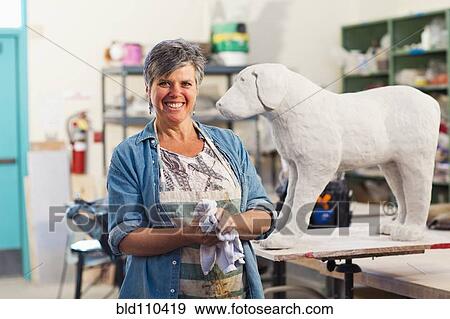 Caucasian sculptor working in studio View Large Photo Image Stock Photo - Caucasian sculptor working in studio. Fotosearch