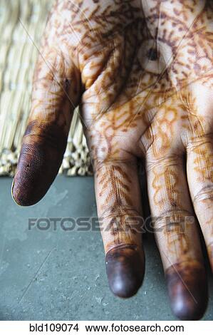 Picture - Close up of tattooed hand. Fotosearch