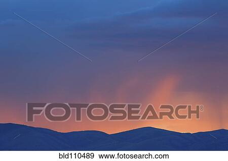 Colorful sunset over rural mountains View Large Photo Image Stock Photo - Colorful sunset over rural mountains. Fotosearch