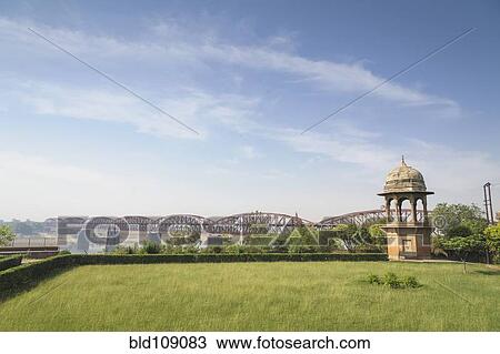 Green park and bridge under blue sky View Large Photo Image Stock Image - Green park and bridge under blue sky. Fotosearch