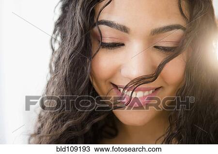 Hispanic woman smiling View Large Photo Image Stock Image - Hispanic woman smiling. Fotosearch