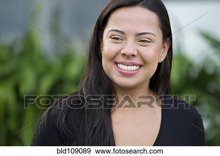 Stock Photo - Hispanic woman smiling. Fotosearch