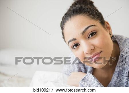 Hispanic woman smiling View Large Photo Image Stock Photo - Hispanic woman smiling. Fotosearch
