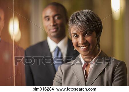 Picture - Black business people smiling. Fotosearch