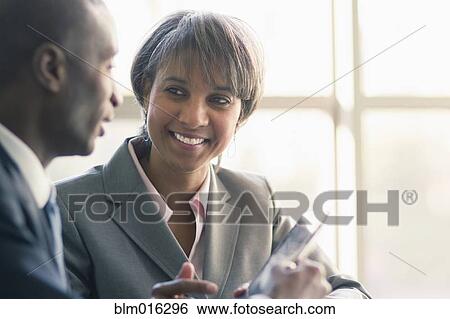 Black business people talking View Large Photo Image Stock Photograph - Black business people talking. Fotosearch