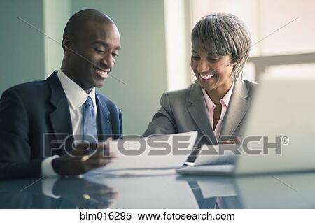 Stock Photography - Black business people talking. Fotosearch