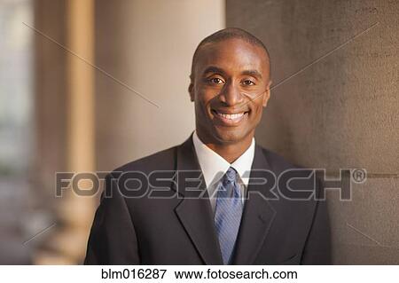 Black businessman smiling View Large Photo Image Stock Photo - Black businessman smiling. Fotosearch