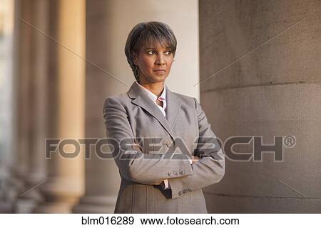 Stock Photo - Black businesswoman outdoors. Fotosearch
