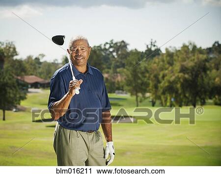 Black man playing golf View Large Photo Image Stock Image - Black man playing golf. Fotosearch