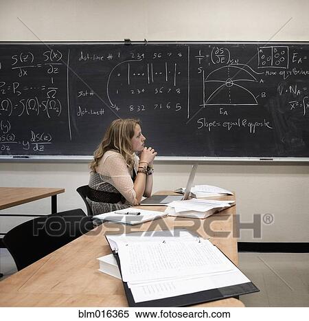 Caucasian student working in classroom View Large Photo Image Stock Photography - Caucasian student working in classroom. Fotosearch