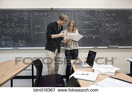 Caucasian students working in classroom View Large Photo Image Stock Photo - Caucasian students working in classroom. Fotosearch