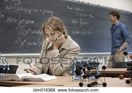 Caucasian students working in classroom View Large Photo Image Stock Photo - Caucasian students working in classroom. Fotosearch