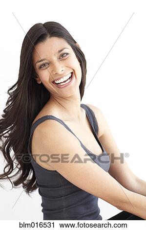 Stock Image - Hispanic woman smiling. Fotosearch