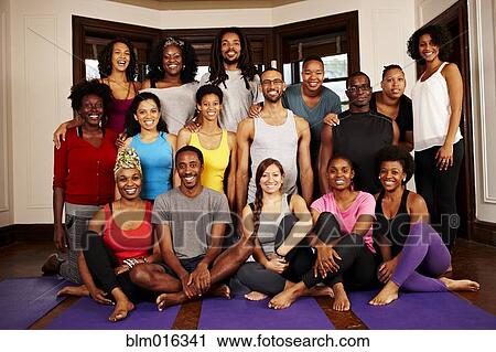 People smiling together in yoga class View Large Photo Image Stock Image - People smiling together in yoga class. Fotosearch