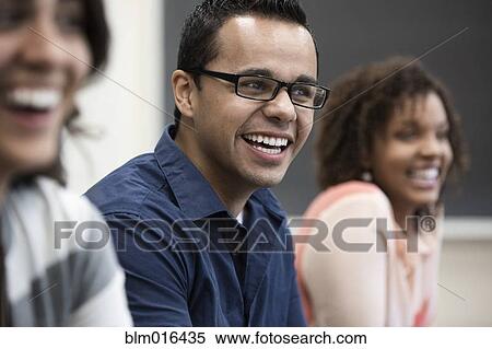 Students laughing in classroom View Large Photo Image Stock Photography - Students laughing in classroom. Fotosearch