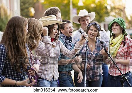 Picture - Students singing together. Fotosearch