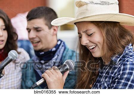 Stock Photography - Students singing together. Fotosearch