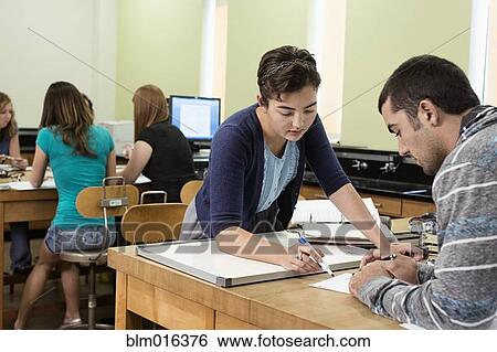 Students working in classroom View Large Photo Image Stock Photograph - Students working in classroom. Fotosearch