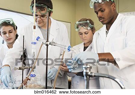 Stock Image - Students working in lab classroom. Fotosearch