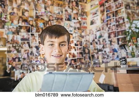 Stock Photo - Boy having hair cut in salon. Fotosearch