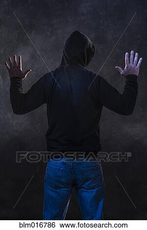 Caucasian man wearing black hoodie View Large Photo Image Stock Photograph - Caucasian man wearing black hoodie. Fotosearch