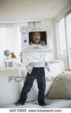 Stock Image - African American boy in robot outfit. Fotosearch