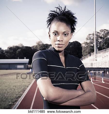 African American runner standing on track View Large Photo Image Stock Photography - African American runner standing on track. Fotosearch