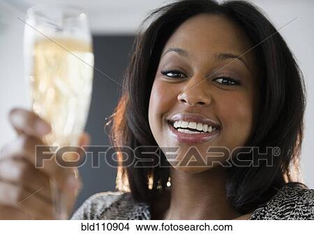 African American woman drinking champagne View Large Photo Image Picture - African American woman drinking champagne. Fotosearch