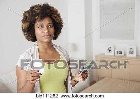 African American woman examining paint swatches View Large Photo Image Stock Image - African American woman examining paint swatches. Fotosearch