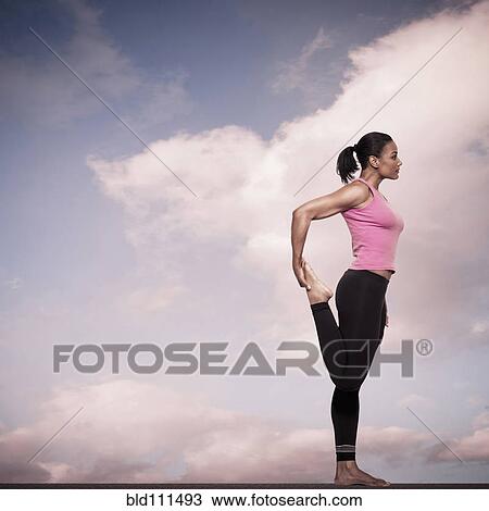 African American woman practicing yoga outdoors View Large Photo Image Stock Image - African American woman practicing yoga outdoors. Fotosearch