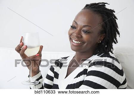 Black woman drinking white wine View Large Photo Image Stock Image - Black woman drinking white wine. Fotosearch