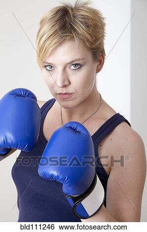 Caucasian boxer with raised fists View Large Photo Image Stock Photograph - Caucasian boxer with raised fists. Fotosearch