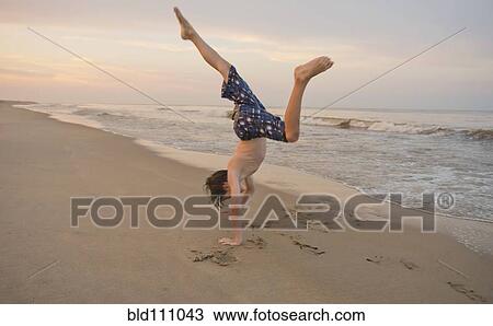 Caucasian boy playing on beach View Large Photo Image Stock Image - Caucasian boy playing on beach. Fotosearch