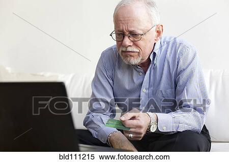 Caucasian man shopping online View Large Photo Image Stock Photography - Caucasian man shopping online. Fotosearch
