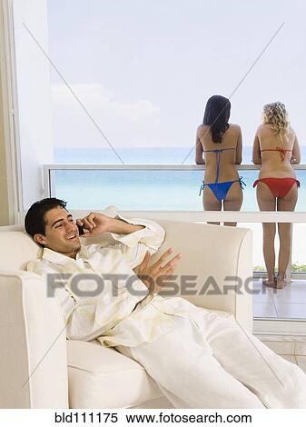 Stock Photography - Caucasian man talking on cell phone. Fotosearch