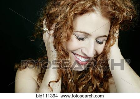 Picture - Caucasian woman smiling. Fotosearch