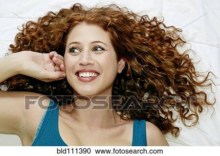 Stock Image - Caucasian woman smiling. Fotosearch